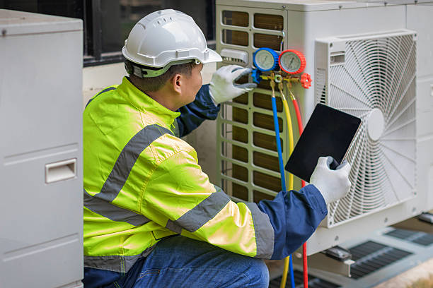 Professional Air Duct Cleaning technician working in Atchison, KS
